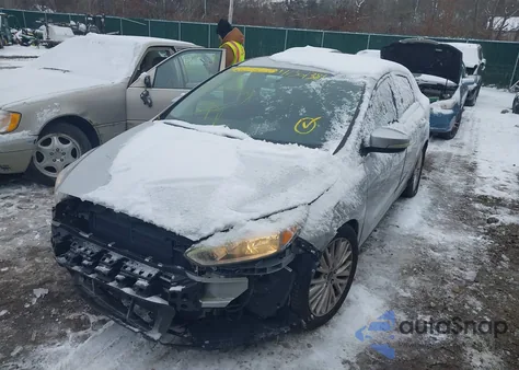 2015 Ford Focus Titanium from USA, damaged, VIN 1FADP3J27FL333002